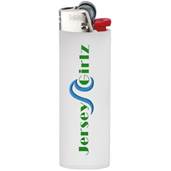 A white lighter with green text

Description automatically generated